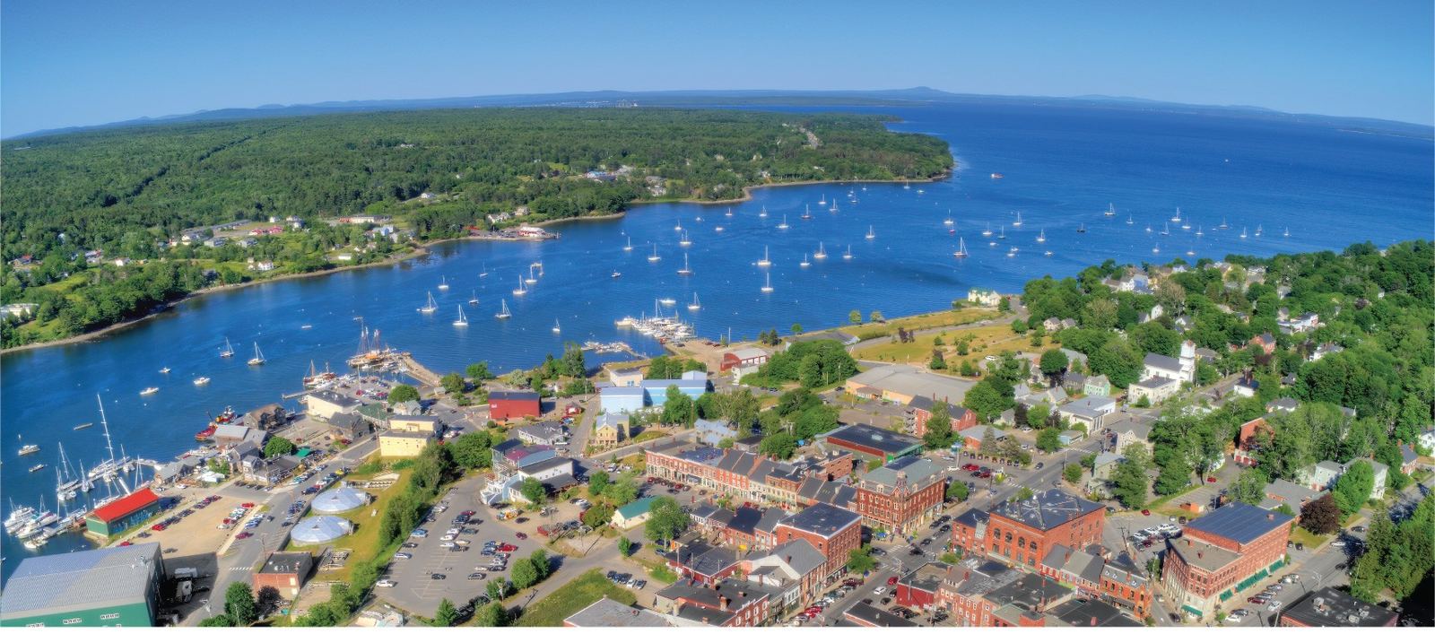 Aerial view of a New England harbor and coastline